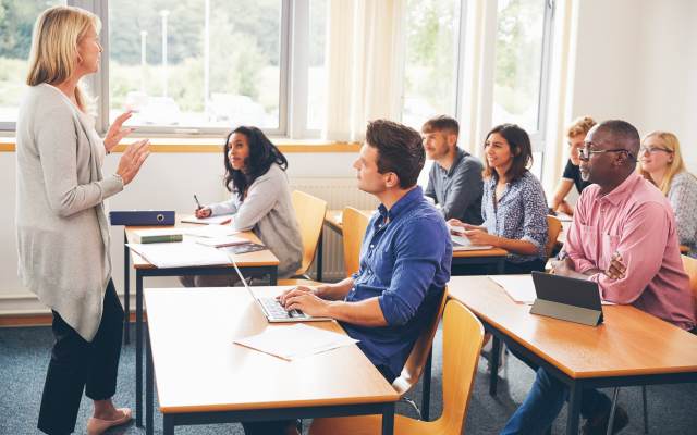 Woman teaching class