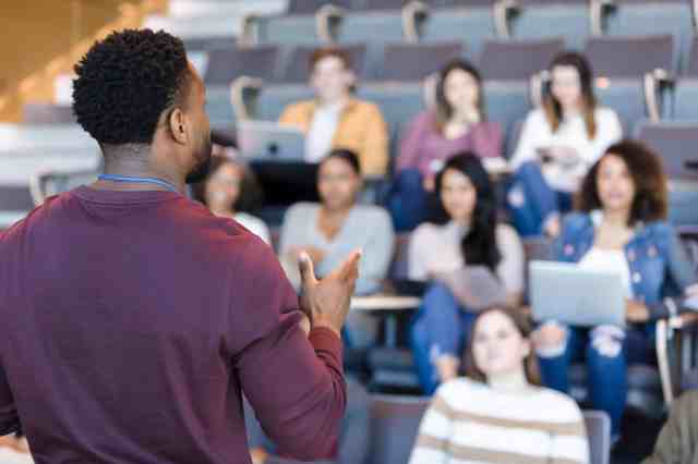 Black male faculty member in classroom